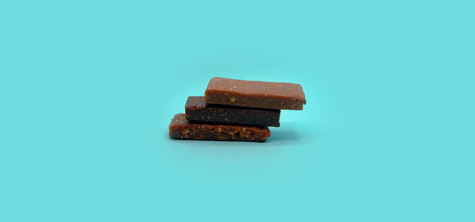 Three Benefeat bars stacked on a turquoise background